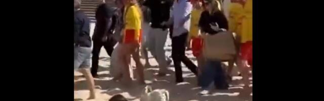 DELFI VOOG | Video_ Harry, Meghan ja nende saatjaskond kõndisid peaaegu üle raamatut lugeva naise