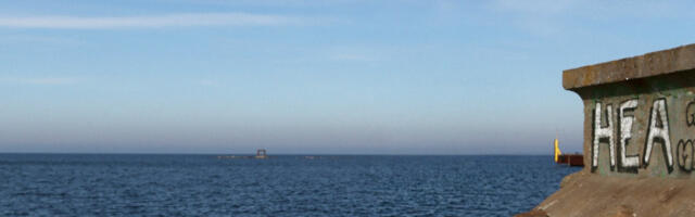 Selg vastu linnahalli seina