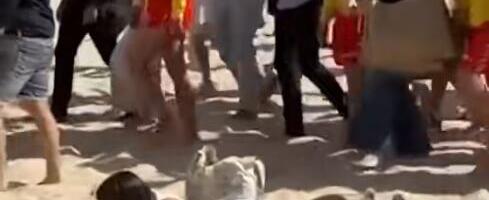 "Ma, dajte joj medalju!" Kupačica na plaži ignorisala princa Harija i Megan Markl i postala internet zvezda